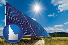 idaho map icon and solar energy panels with photovoltaic cells