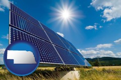 nebraska map icon and solar energy panels with photovoltaic cells