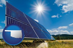 oklahoma map icon and solar energy panels with photovoltaic cells